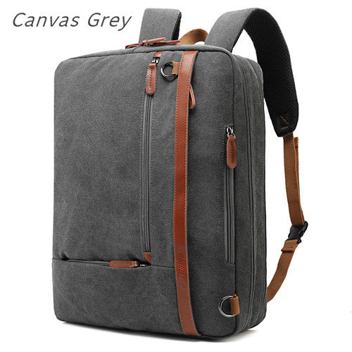 Canvas grey backpack with brown straps on a white background