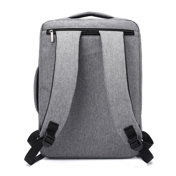 Gray backpack with black straps on a white background