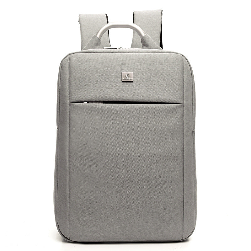 Gray backpack with a visible brand logo on a white background