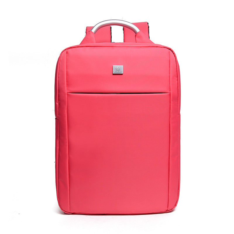 Pink backpack with a visible brand logo on a white background