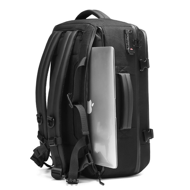 Black backpack with a laptop compartment on a white background