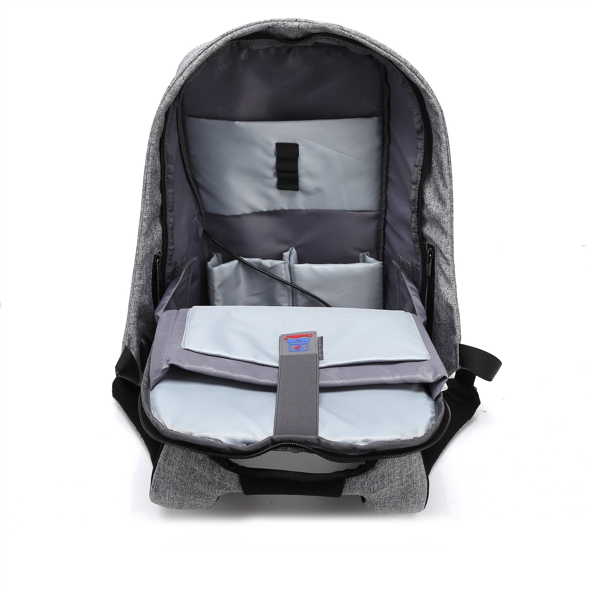 Gray backpack with compartments on a white background